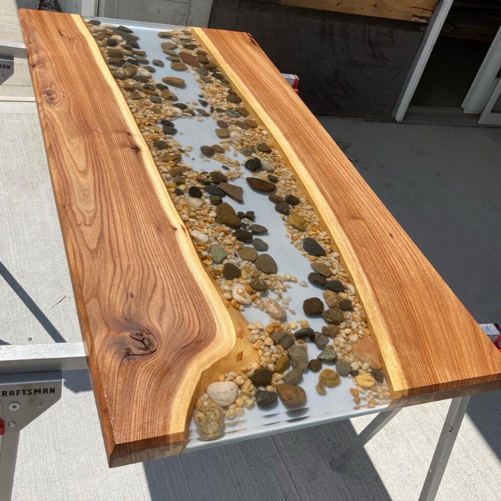 Amazingly Clear Pour using wood and rocks creating a beautiful stream-like result using Liquid Glass Deep Pour Epoxy